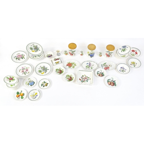 145 - A quantity of Portmeirion dinner wares to include plates, serving dishes, bowls, butter dish and cov... 