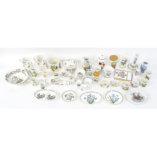 146 - A large quantity of Portmeirion wares to include serving plates, jugs, bowls, vases, cafetiere, cand... 