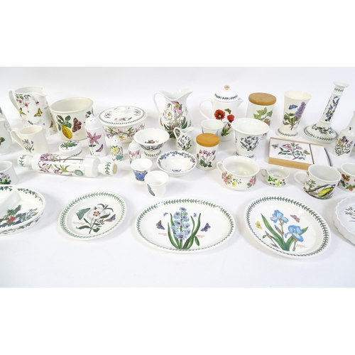 146 - A large quantity of Portmeirion wares to include serving plates, jugs, bowls, vases, cafetiere, cand... 