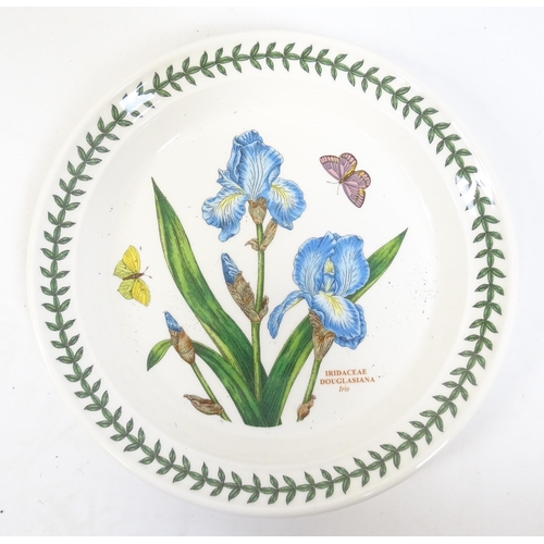 146 - A large quantity of Portmeirion wares to include serving plates, jugs, bowls, vases, cafetiere, cand... 