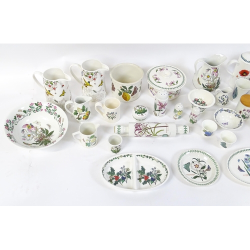 146 - A large quantity of Portmeirion wares to include serving plates, jugs, bowls, vases, cafetiere, cand... 