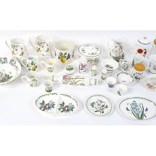 146 - A large quantity of Portmeirion wares to include serving plates, jugs, bowls, vases, cafetiere, cand... 