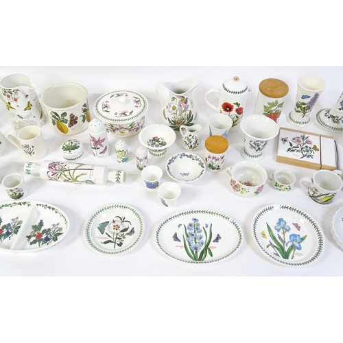 146 - A large quantity of Portmeirion wares to include serving plates, jugs, bowls, vases, cafetiere, cand... 