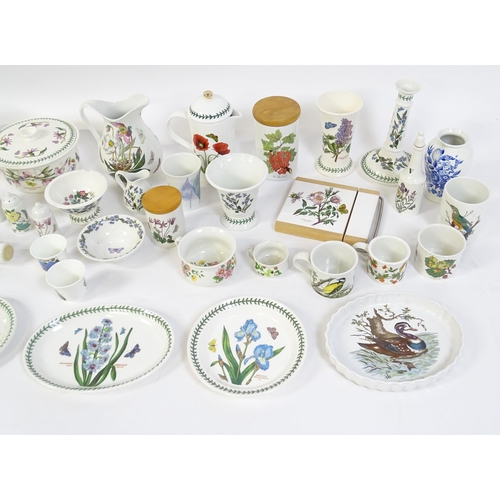 146 - A large quantity of Portmeirion wares to include serving plates, jugs, bowls, vases, cafetiere, cand... 