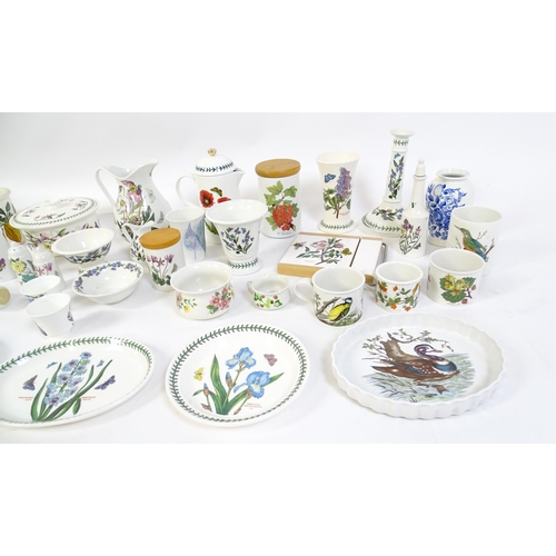 146 - A large quantity of Portmeirion wares to include serving plates, jugs, bowls, vases, cafetiere, cand... 