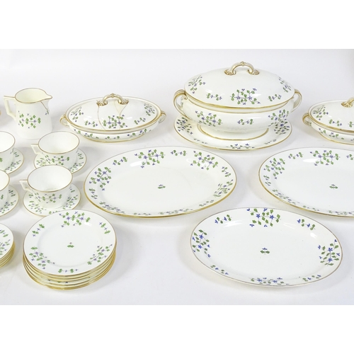 147 - A large quantity of Minton dinner wares in the Cornflower pattern to include, plates, soup dishes, s... 