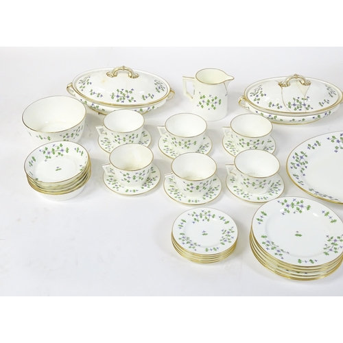 147 - A large quantity of Minton dinner wares in the Cornflower pattern to include, plates, soup dishes, s... 