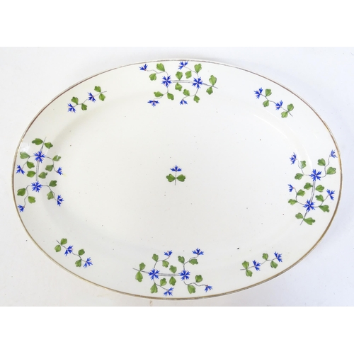 147 - A large quantity of Minton dinner wares in the Cornflower pattern to include, plates, soup dishes, s... 