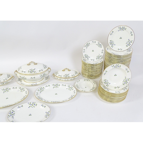 147 - A large quantity of Minton dinner wares in the Cornflower pattern to include, plates, soup dishes, s... 