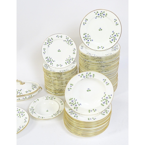 147 - A large quantity of Minton dinner wares in the Cornflower pattern to include, plates, soup dishes, s... 