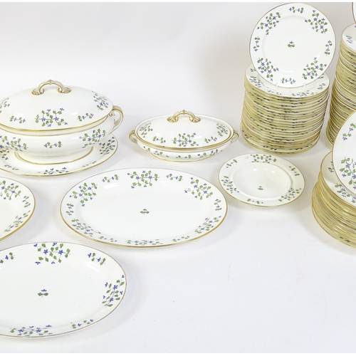 147 - A large quantity of Minton dinner wares in the Cornflower pattern to include, plates, soup dishes, s... 