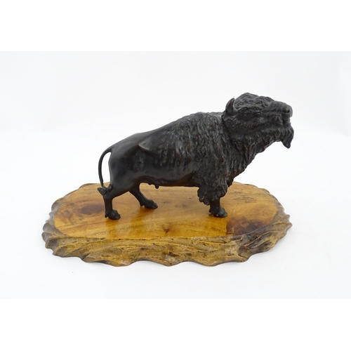 1005 - A Japanese Meiji period bronze model of a bison standing. Bears Character marks under. Together with... 