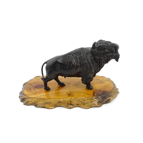 1005 - A Japanese Meiji period bronze model of a bison standing. Bears Character marks under. Together with... 