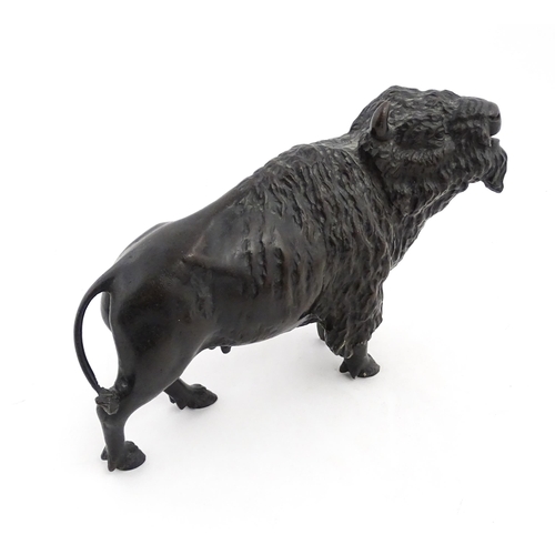 1005 - A Japanese Meiji period bronze model of a bison standing. Bears Character marks under. Together with... 