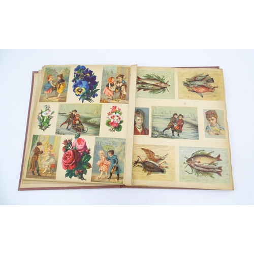 962 - A Victorian scrapbook to include various prints, engravings, greetings cards, love tokens, floral an... 