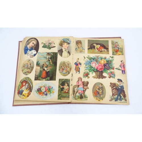 962 - A Victorian scrapbook to include various prints, engravings, greetings cards, love tokens, floral an... 