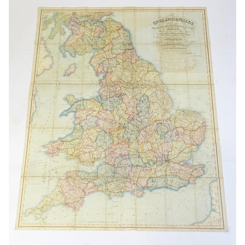 977 - Map: A c1840 engraved map of England and Wales by J. & C. Walker of London, laid on linen and sectio... 