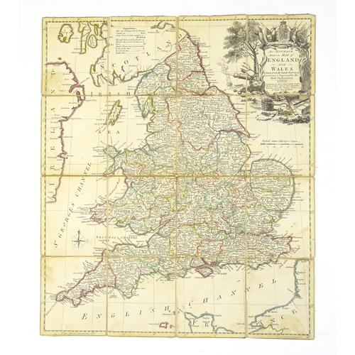 982 - Map: An 18thC engraved map of England and Wales, laid on linen and sectionalised with slip cover. En... 