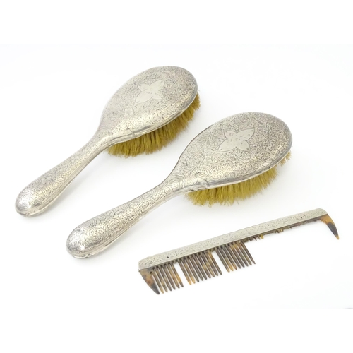 438 - Two silver backed brushes with engraved decoration hallmarked Birmingham 1893, maker Hilliard & Thom... 