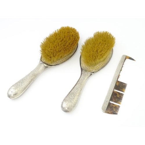 438 - Two silver backed brushes with engraved decoration hallmarked Birmingham 1893, maker Hilliard & Thom... 