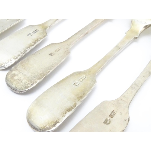 441 - A quantity of Colonial Indian white metal Fiddle pattern cutlery / flatware, maker Hamilton & Co. st... 