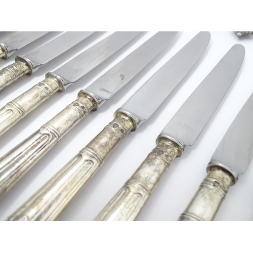 445 - A quantity of silver handled Albany pattern knives, hallmarked London 1961, maker C J Vander Ltd. 12... 