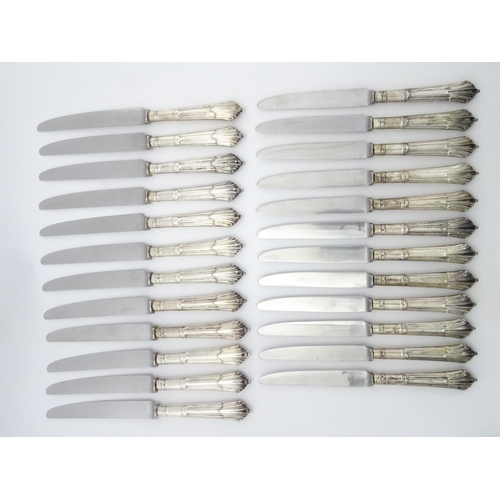 445 - A quantity of silver handled Albany pattern knives, hallmarked London 1961, maker C J Vander Ltd. 12... 