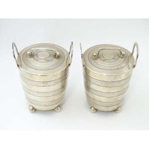 456 - A pair of unusual 19thC Indian Colonial silver tea caddies / lidded containers with twin handles and... 