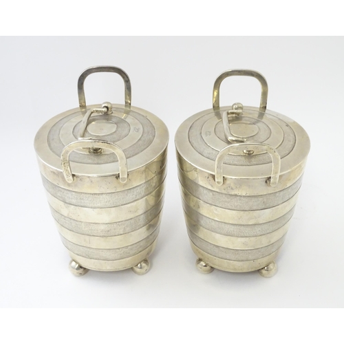 456 - A pair of unusual 19thC Indian Colonial silver tea caddies / lidded containers with twin handles and... 