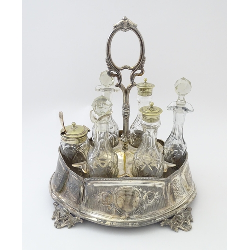 515 - A silver plate cruet stand with six various cut glass cruet bottles. Approx. 12