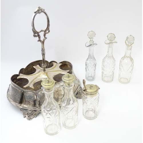 515 - A silver plate cruet stand with six various cut glass cruet bottles. Approx. 12