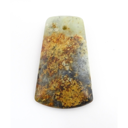 1018 - A Chinese polished jade axehead. Approx. 5