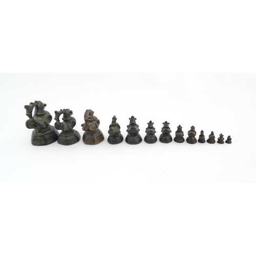 1024 - A quantity of Burmese graduated bronze opium weights modelled as crested ducks. Largest approx. 4 1/... 