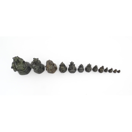 1024 - A quantity of Burmese graduated bronze opium weights modelled as crested ducks. Largest approx. 4 1/... 