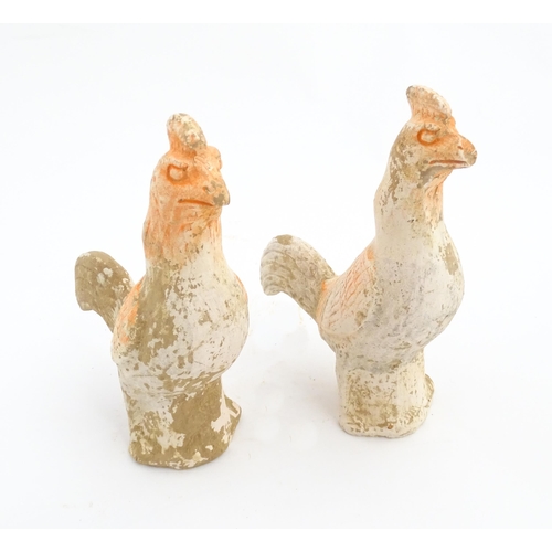 1031 - A pair of Chinese Tang dynasty pottery models of cockerels / roosters. Approx. 6 3/4