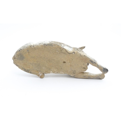 1032 - A Chinese Han dynasty pottery model of a recumbent sheep. Approx. 6 3/4