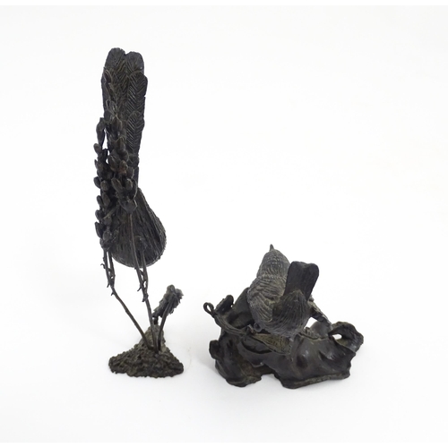 1043 - Two 20thC cast bronze ornithological / bird studies comprising a model of a wren perched on an old b... 