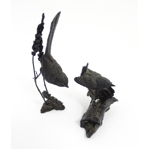 1043 - Two 20thC cast bronze ornithological / bird studies comprising a model of a wren perched on an old b... 