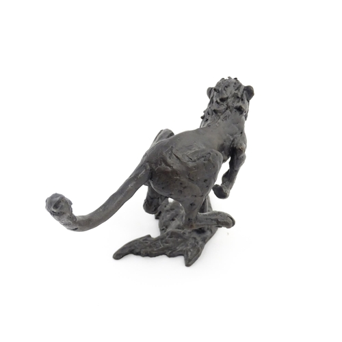 1049 - A 20thC limited edition bronze Flying Cheetah sculpture by Jonathan Sanders. Facsimile signature, an... 