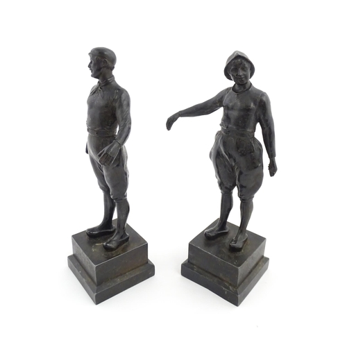 1050 - Two 20thC Continental cast figures modelled as traditional Dutch fishermen. Approx. 10