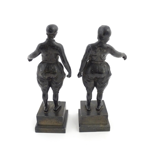 1050 - Two 20thC Continental cast figures modelled as traditional Dutch fishermen. Approx. 10