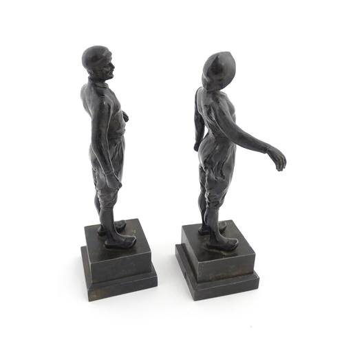 1050 - Two 20thC Continental cast figures modelled as traditional Dutch fishermen. Approx. 10