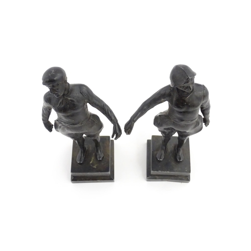 1050 - Two 20thC Continental cast figures modelled as traditional Dutch fishermen. Approx. 10