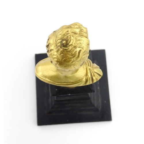 1057 - A 19thC gilt bronze portrait bust depicting Napoleon II, the Duke of Reichstadt on a stepped plinth,... 