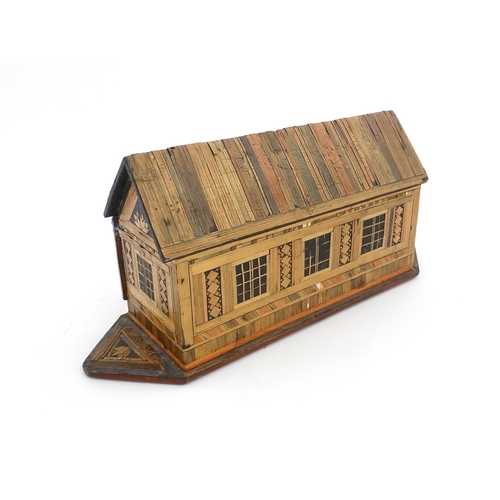 1060 - A 19thC naive straw work Noah's Ark with flat bottom and side opening sliding door. Together with fo... 