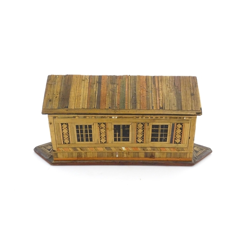 1060 - A 19thC naive straw work Noah's Ark with flat bottom and side opening sliding door. Together with fo... 