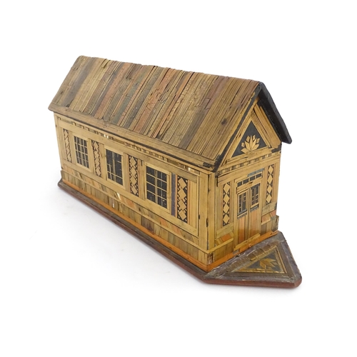 1060 - A 19thC naive straw work Noah's Ark with flat bottom and side opening sliding door. Together with fo... 