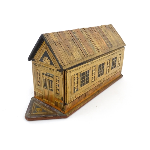 1060 - A 19thC naive straw work Noah's Ark with flat bottom and side opening sliding door. Together with fo... 