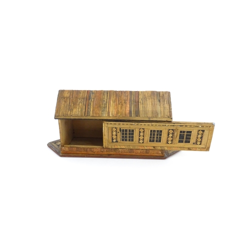 1060 - A 19thC naive straw work Noah's Ark with flat bottom and side opening sliding door. Together with fo... 