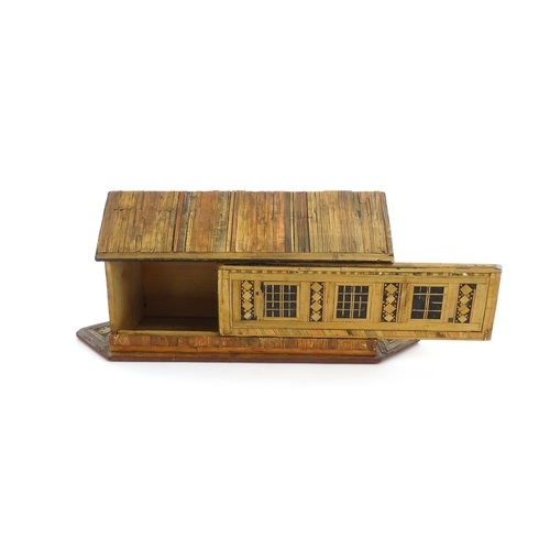 1060 - A 19thC naive straw work Noah's Ark with flat bottom and side opening sliding door. Together with fo... 